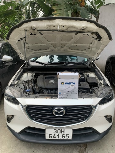 Thay bình ắc quy Q85/115d23L cho xe Mazda